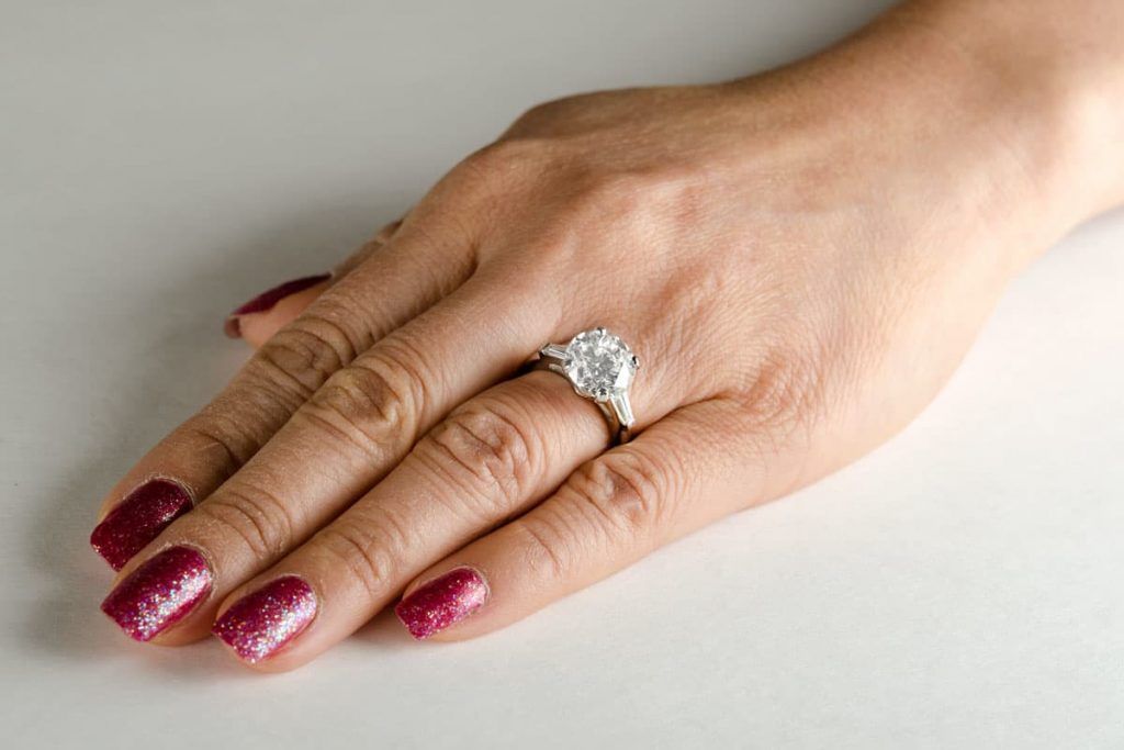 Brilliant Cut Diamond Ring on Finger