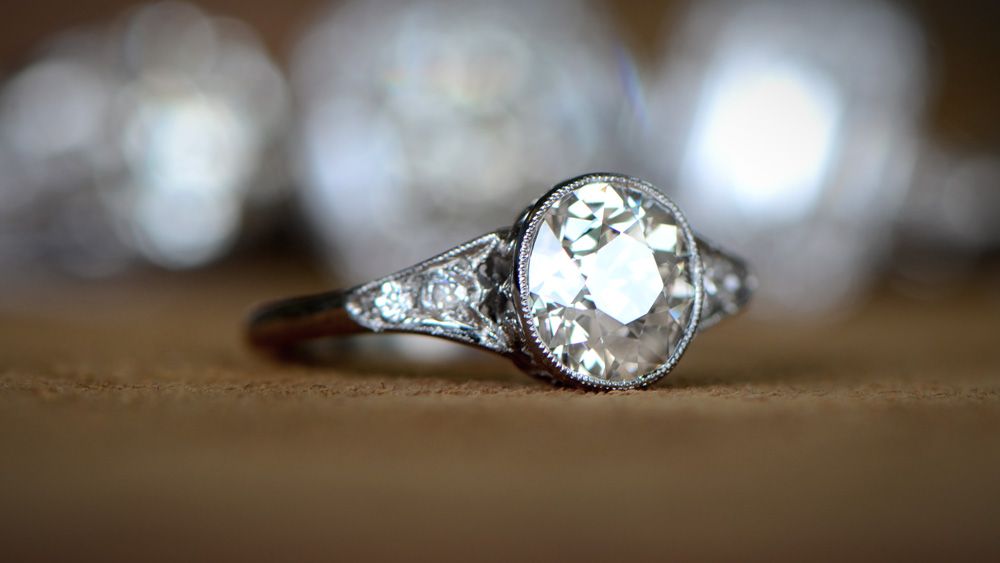Bezel Engagement Ring with Artistic Background