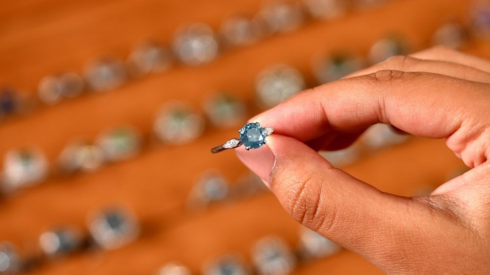 Blue Diamond Ring with diamonds on Sides from Estate Diamond Jewelry