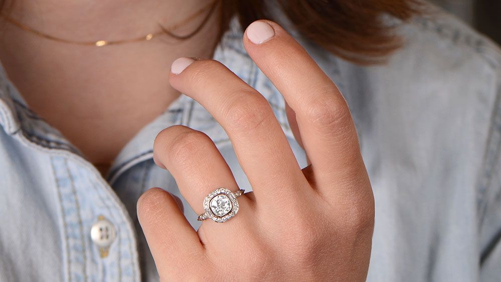 $10000 Diamond Ring on Finger