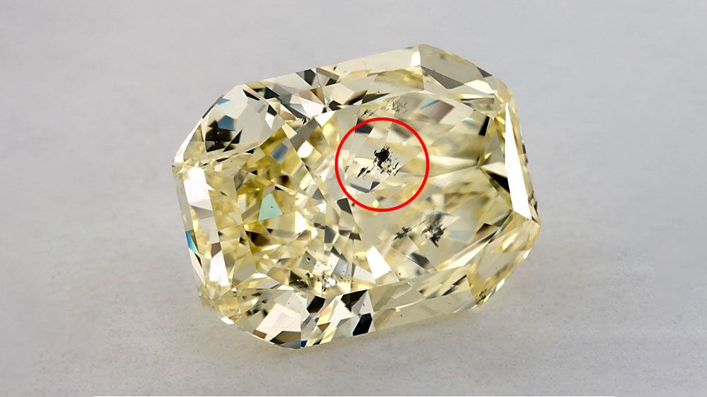 Canary Yellow Diamond with Black Clarity Inclusion in Center