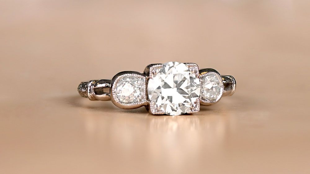 Delicate Three Stone Platinum Diamond Engagement Ring 