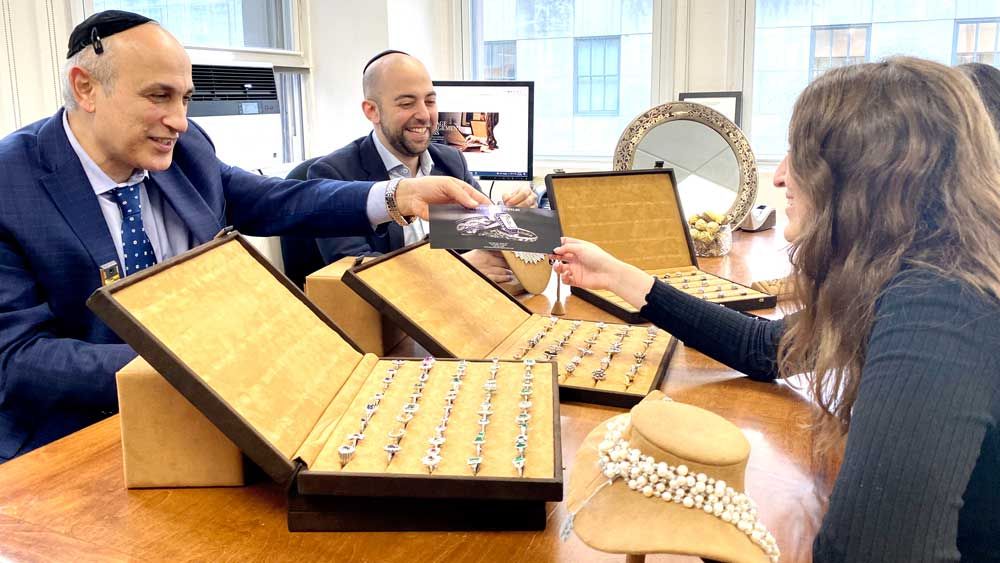 Afshin and Benjamin in Showroom with Rackcard and Estate Jewelry