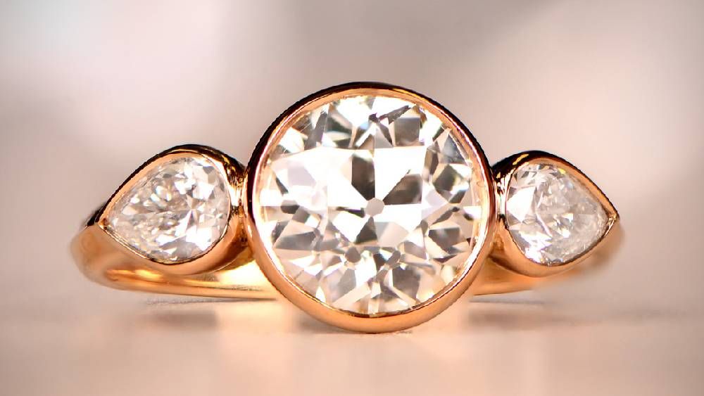 Natural Diamond Ring With Pear Cut Side Diamonds