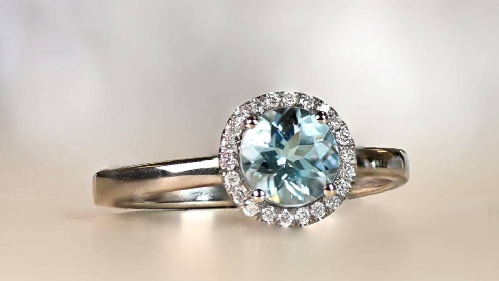 Aqua Halo Engagement Ring Featuring Aquamarine And Diamonds