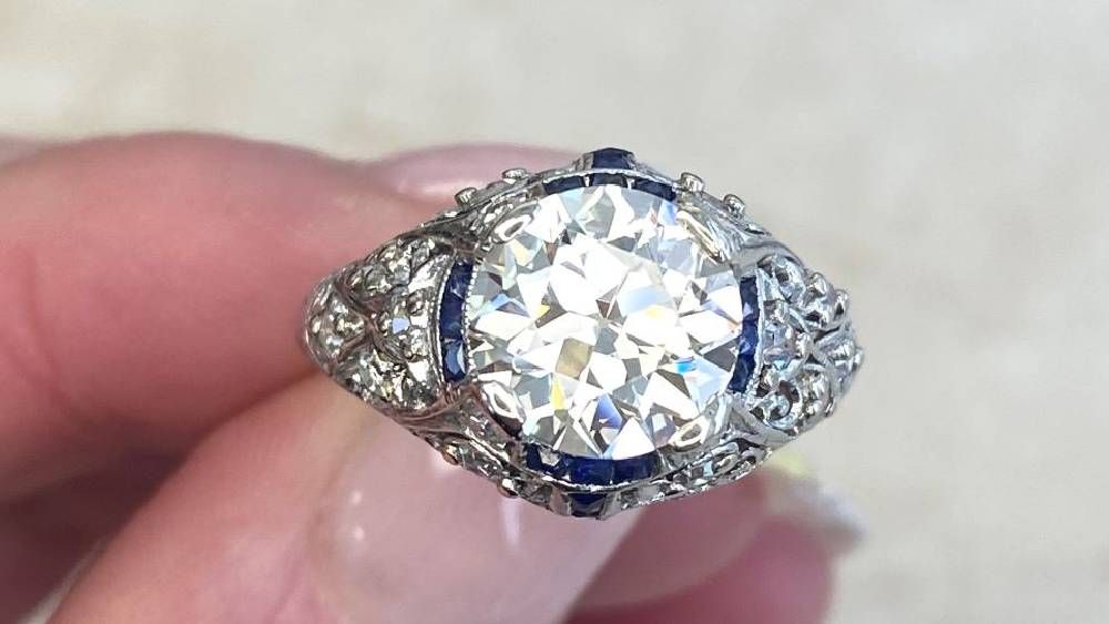 Curel Rounded Diamond Engagement Ring With Sapphire Ribbons