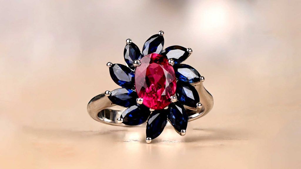 Unique Rubellite Koy Ring With A Sapphire Halo