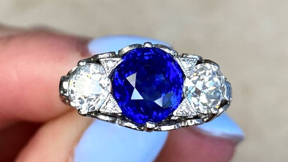 Sapphire Engagement Ring With Triangle Diamond Accents