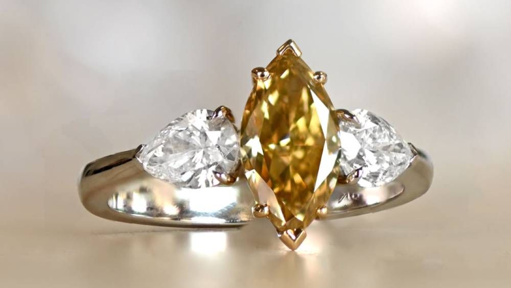Fancy Yellow Marquise Diamond Ring With Side Diamonds