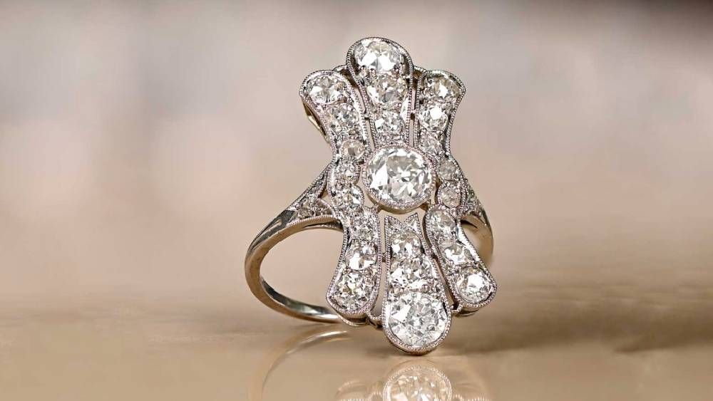 Large Elongated Diamond Ring With Plumes Design