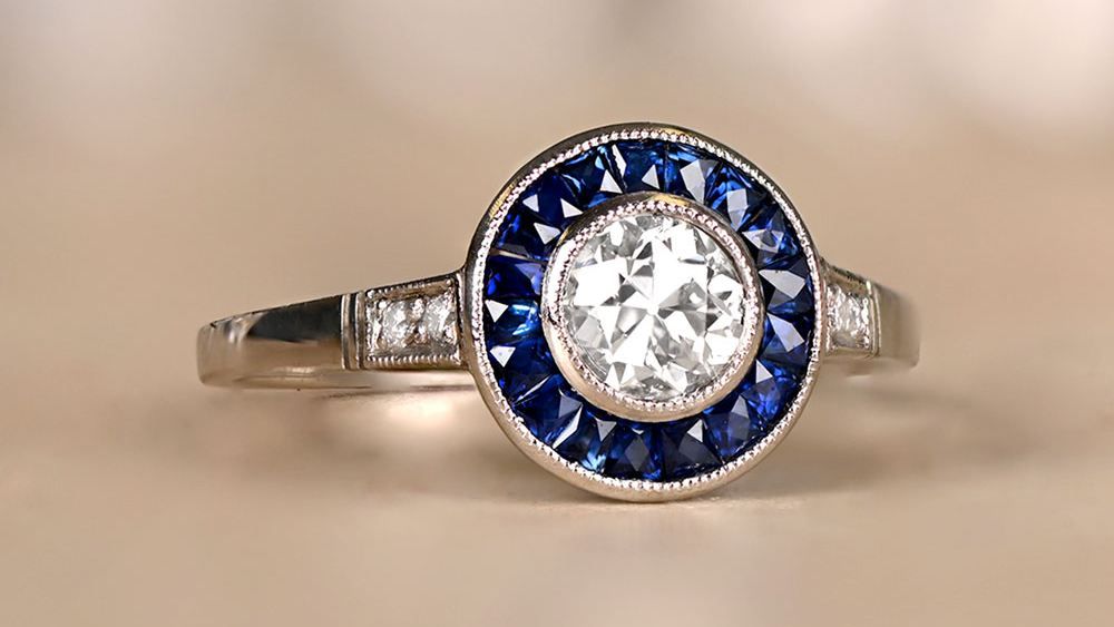 Central Park Engagement Ring Featuring A Sapphire Halo