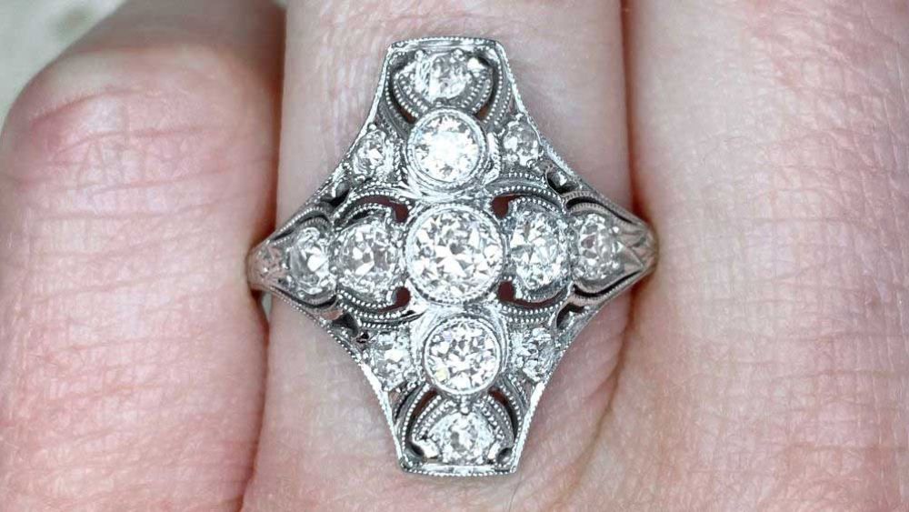 Ring With Plus Shaped Line Of Diamonds