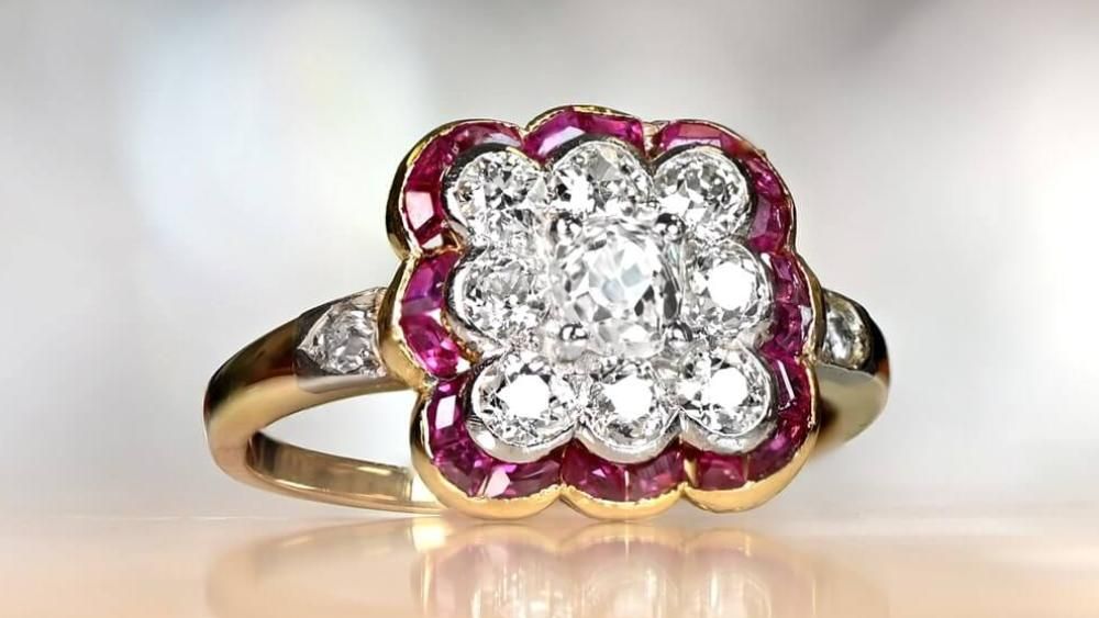 Lorraine Cushion Cut Engagement Ring Featuring Ruby Halo