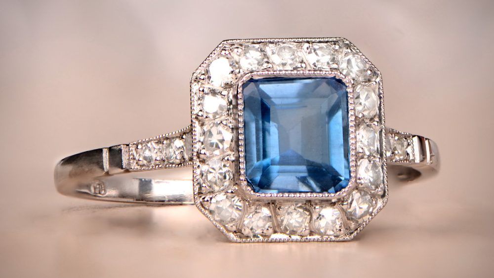 Tide Aquamarine Engagement Ring Featuring A Diamond Halo