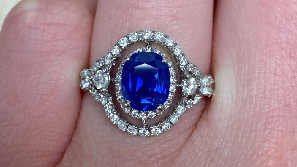 Estate diamond jewelry Lane double halo sapphire ring