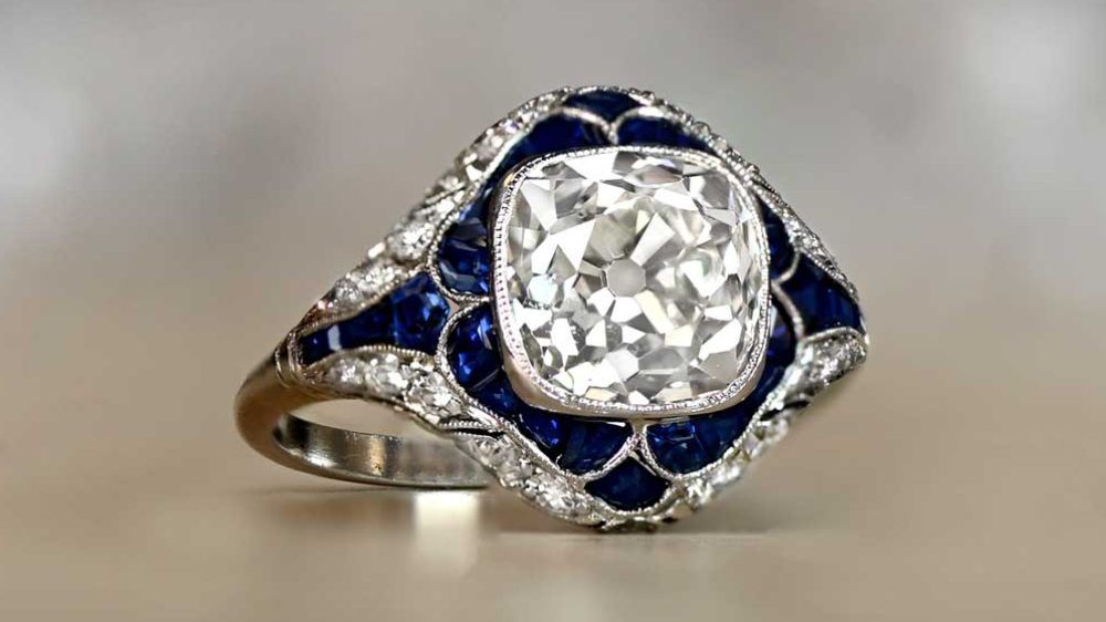 Floral Motif Tournus Diamond And Sapphire Engagement Ring
