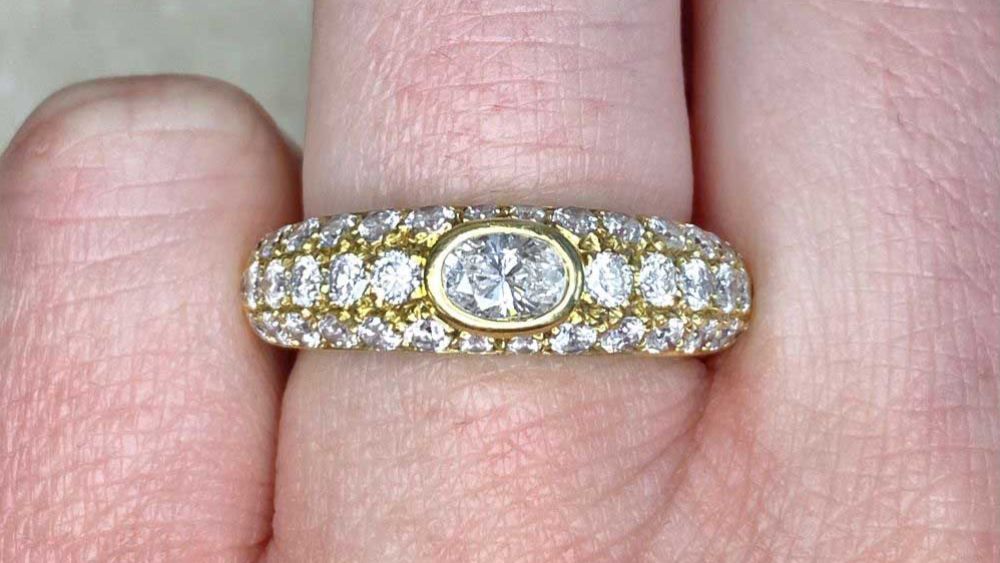Diamond Studded Gold Ring With Oval Center Diamond