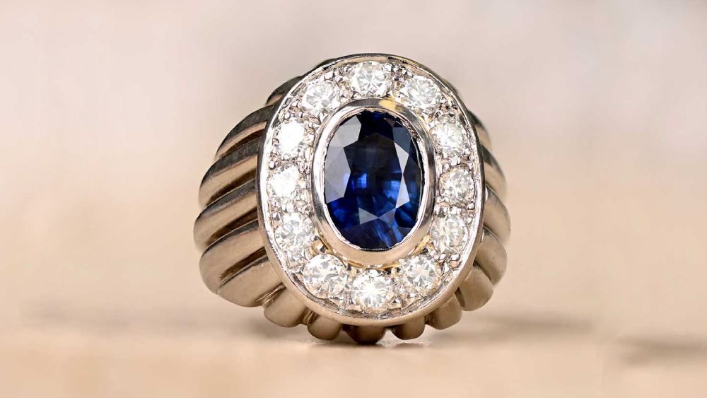 Large Rounded Ring With Center Sapphire And Diamond Halo