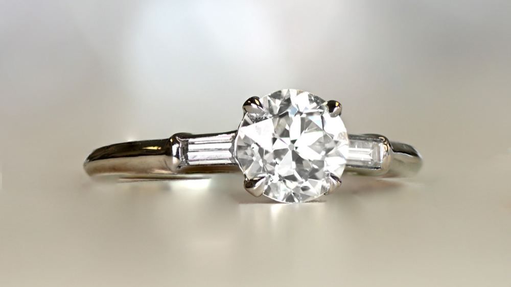 Dainty Platinum Diamond Ring With Shoulder Diamonds