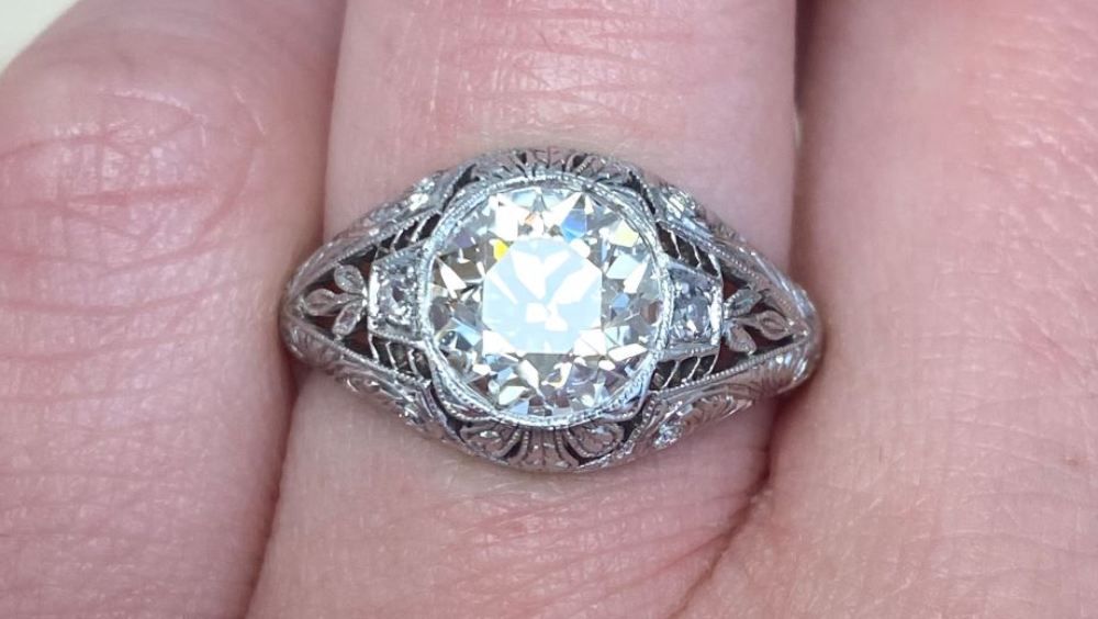 Rounded Diamond Engagement Ring With Detailed Openwork And Engravings