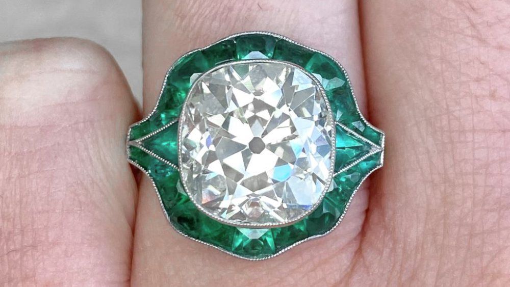 Tropea Cushion Cut Diamond Ring With Emerald Halo