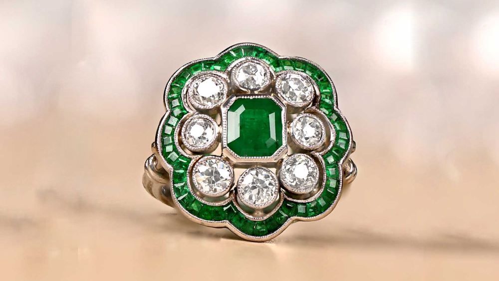 Holme Green Ring Featuring Emerald And Diamond Halos