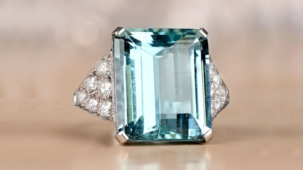Large Aquamarine Ring With Diamond Adorned Triangular Shoulders