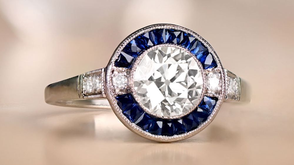 Milan Round Diamond Engagement Ring With Sapphire Halo
