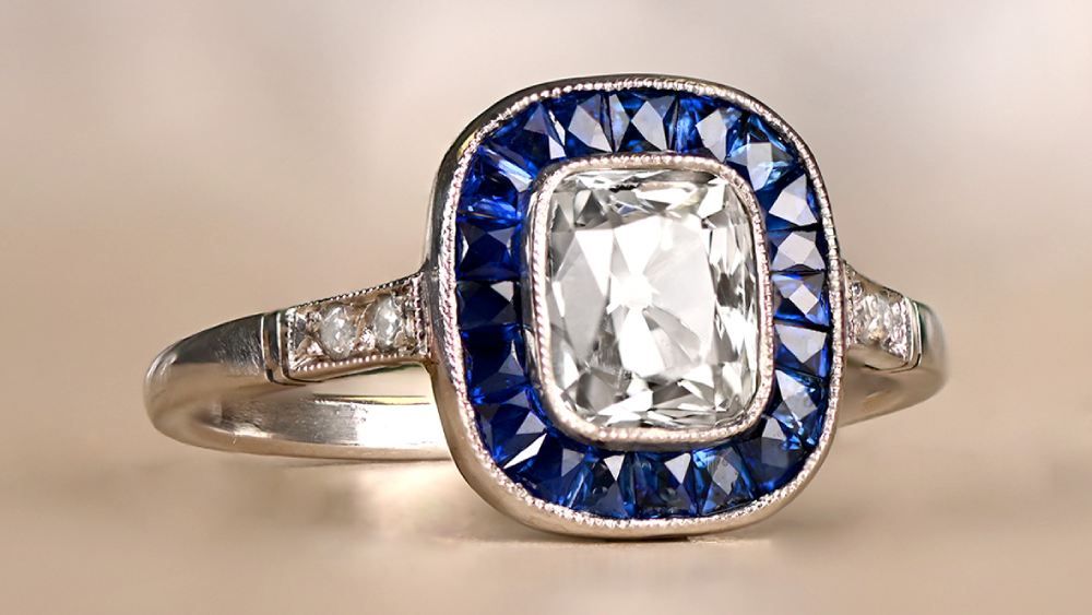 Diamond Ring With Subtle Shank And Sapphire Halo