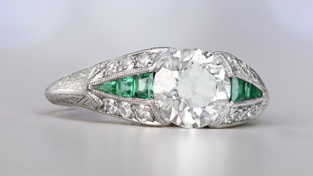 Art Deco Diamond Ring Featuring Triangular Emerald Sections