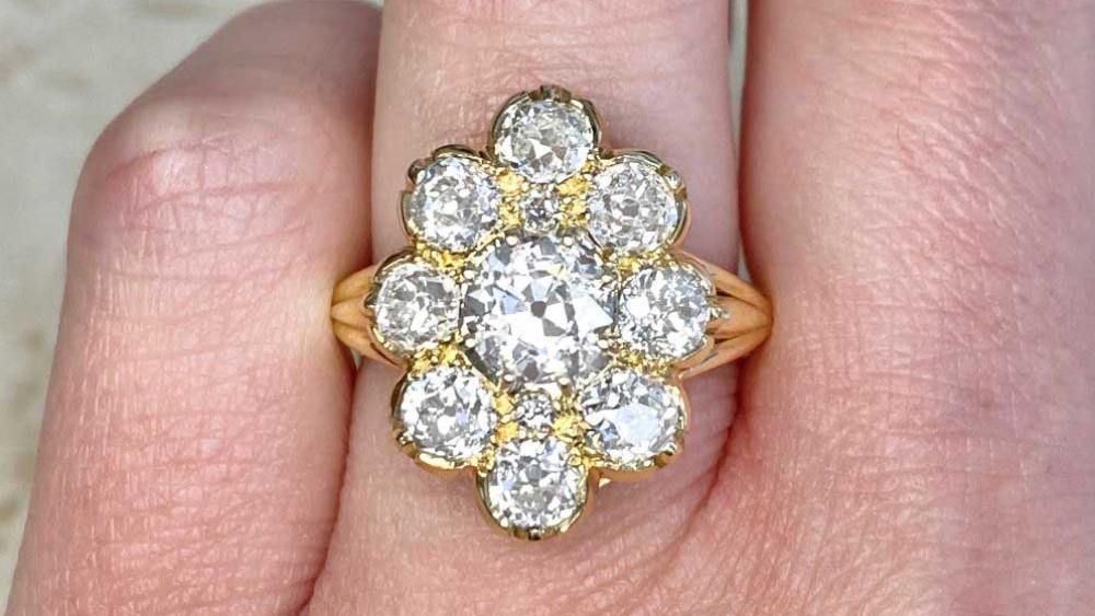 Elongated Yellow Gold Ring With Floral Diamond Cluster