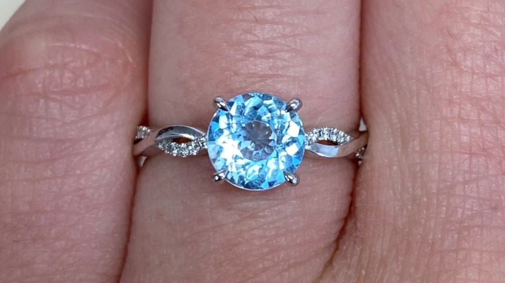Cutler Bay Twisted Engagement Ring Featuring Aquamarine Gemstone