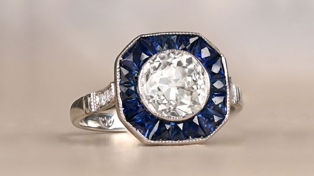 Bellino Diamond Engagement Ring Featuring A Sapphire Halo
