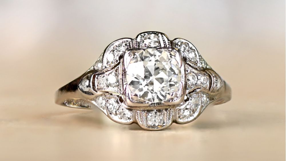 Uniquely Shaped Diamond Ring Featuring Additional Diamonds