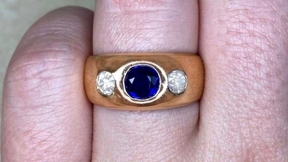 Vintage Yellow Gold Arezza Ring Featuring A Center Sapphire