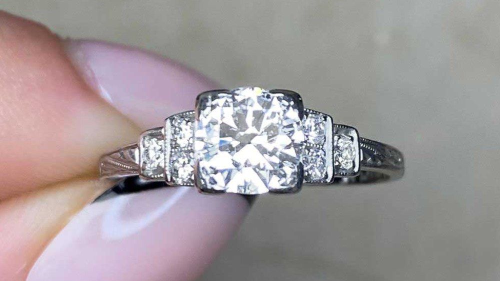 Delicate Diamond Ring With Step Down Diamond Shoulders