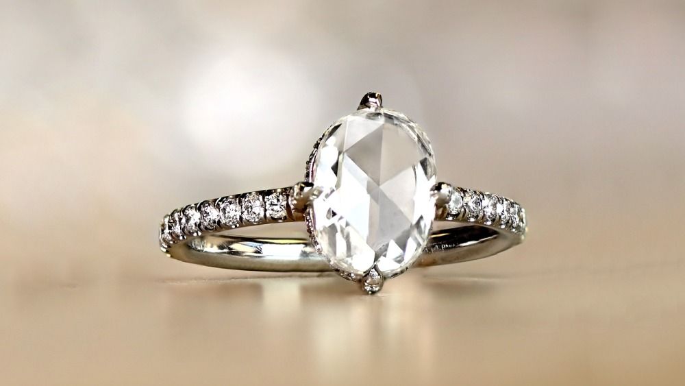 Large Diamond Ring Featuring Diamond Adorned Gallery And Shank