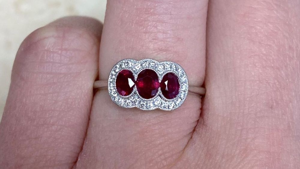 Platinum Three Stone Ruby Ring With Diamond Halo