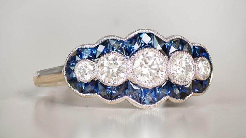 Wide Five Diamond Ring With Sapphire Halo