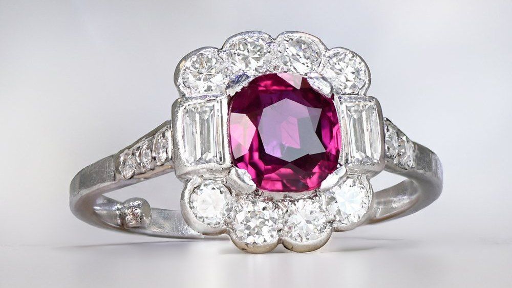 Ruby Centered Platinum Ring With Floral Diamond Halo