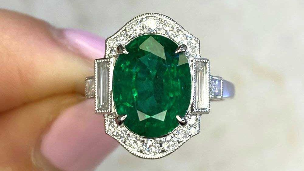 Large Emerald Ring With Diamond Halo And Unique Shape
