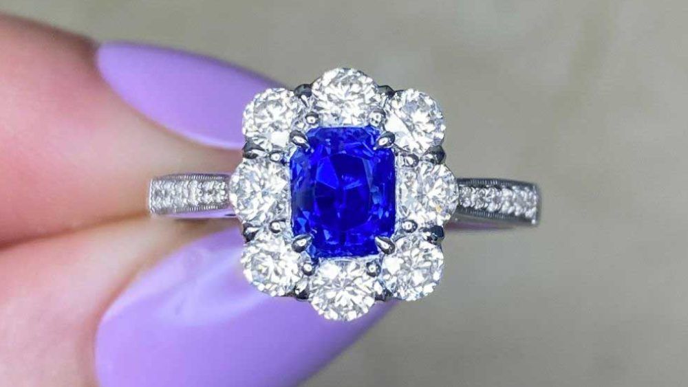 Sapphire Centered Ring With Floral Eight Diamond Halo
