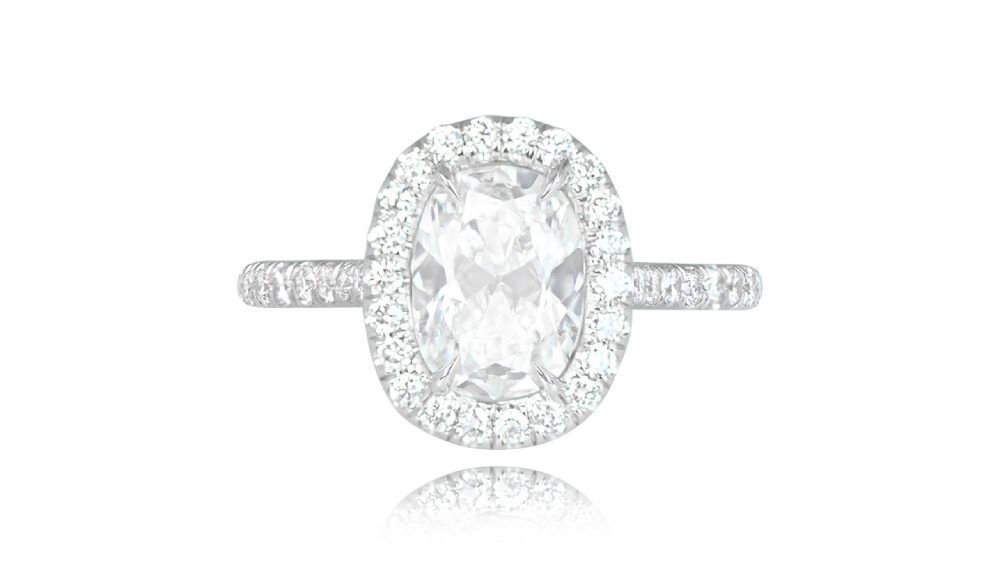 White Gold Diamond Ring Featuring Diamond Halo And Shoulders