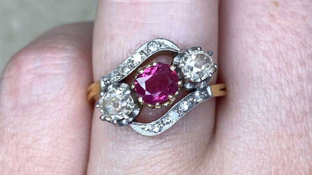 Three Stone Engagement Ring Featuring Ruby And Diamonds