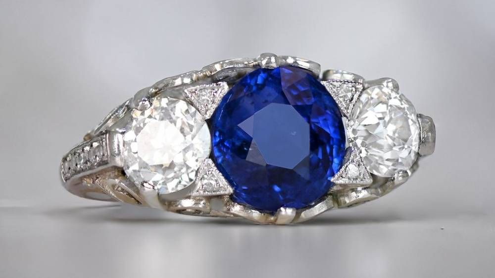 Sapphire Centered Platinum Ring With Diamond Accents