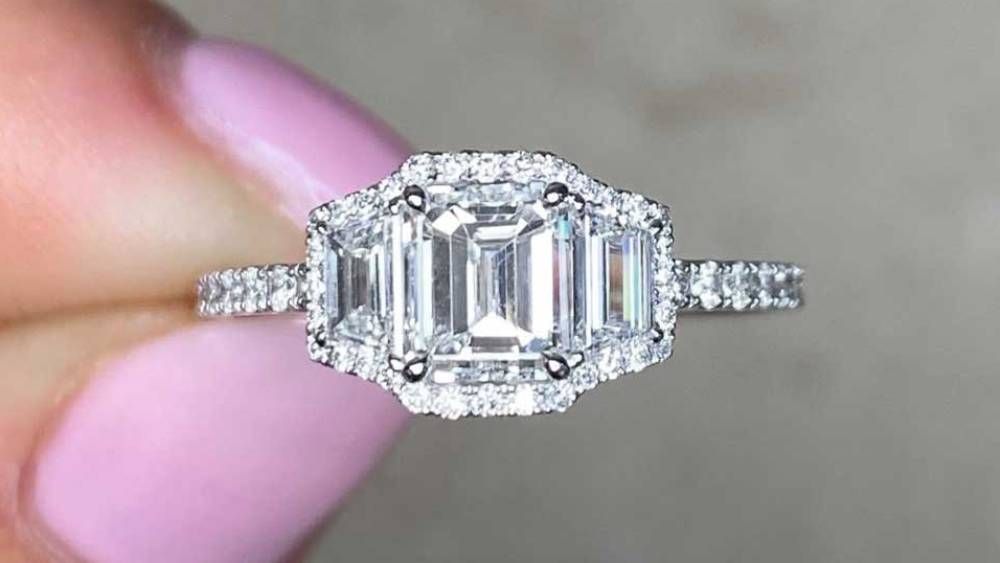 Diamond Ring Featuring Geometric Design And Diamond Accents
